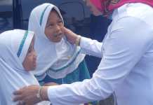 Hj. Winarti SE Serahkan Bantuan PMTAS Untuk 51.759 Siswa SD & MI se-Kabupaten Tulangbawang