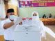 Pilkada Serentak, Nanang dan Istri Nyoblos di TPS 01 Desa Way Galih